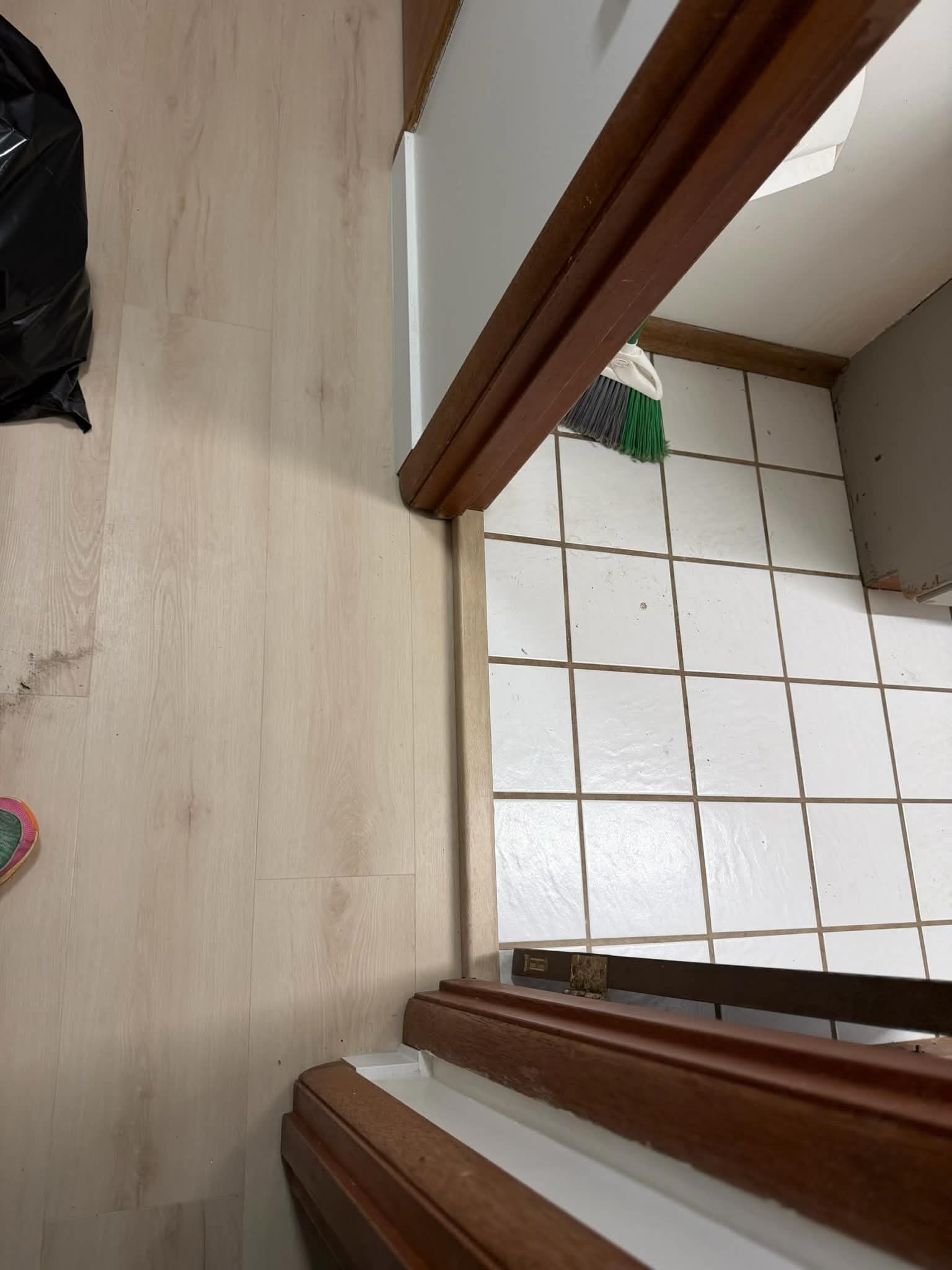 LVP flooring transition to tiled entryway