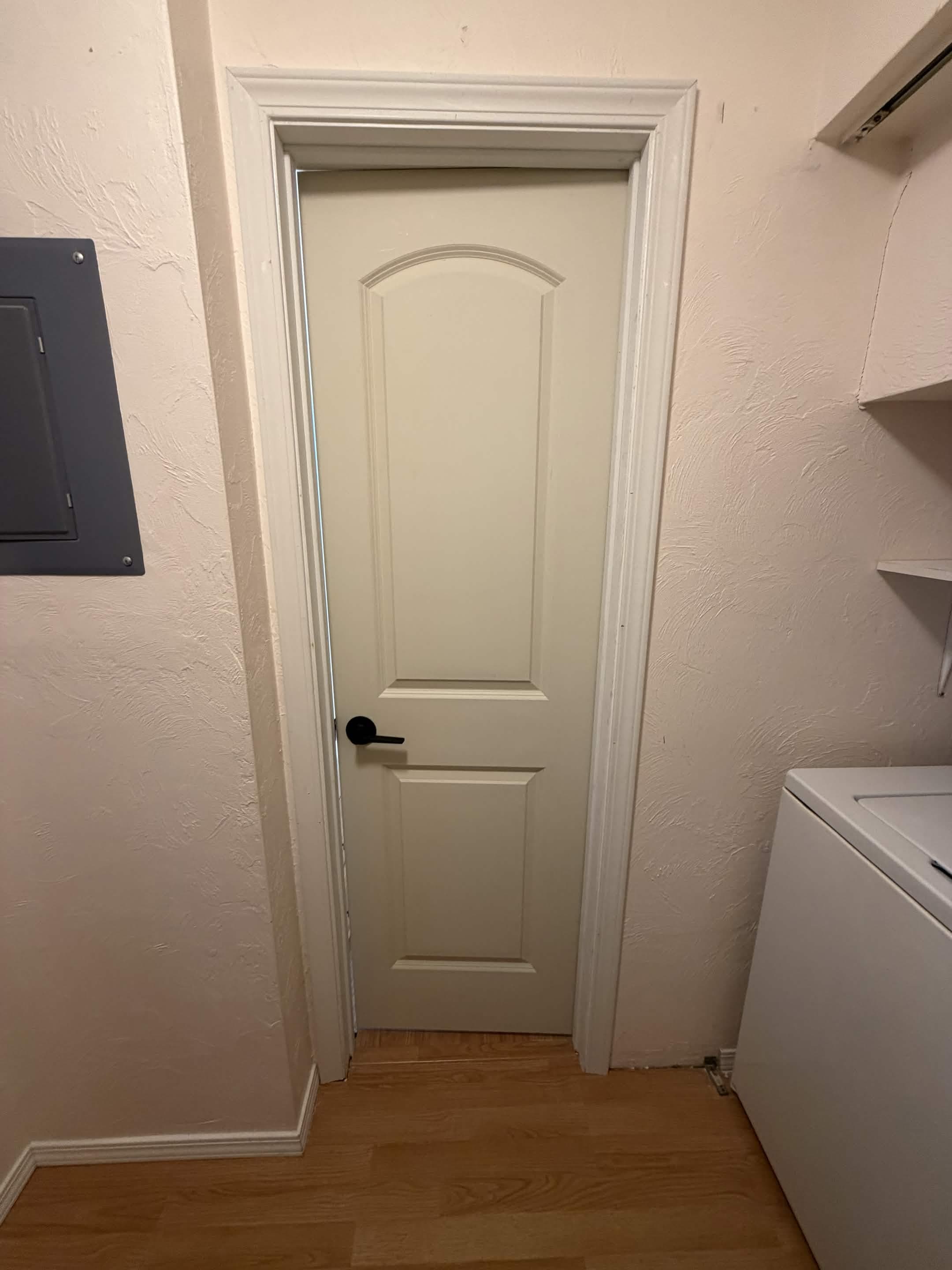 Interior door and trim install in laundry room by Sourdough Construction, Juneau Alaska